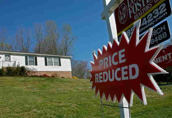 For Sale Signs Multiply With Weakening Housing Market