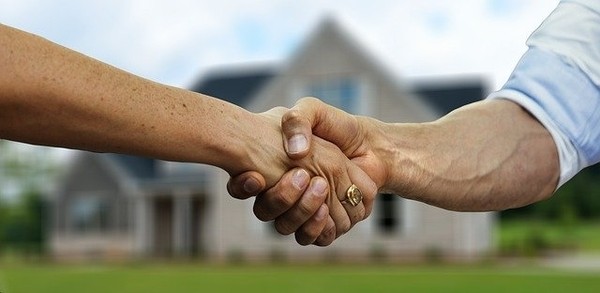 A licensed real estate professional, a real estate agent helps people sell or buy real estate properties