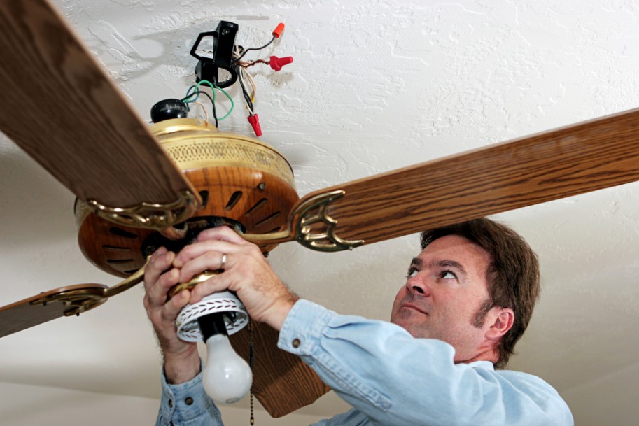 electrician installing fan
